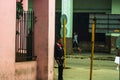 Havana, Cuba Ã¢â¬â 2019. Young Cuban man waiting on the street corner